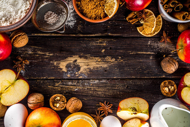 Autumn baking concept. Cooking baking background with ingredients, spices and utensils. All you need for baking traditional autumn apple pie, on rustic wooden background copy space - Fotografie, Obrázek