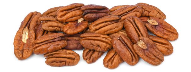 Pile Pecan nuts isolated on white background. Heap shelled Pecans nut closeup - Photo, Image