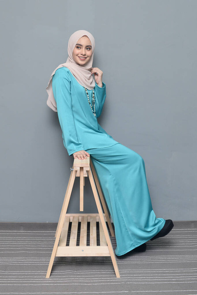 Hijab fashion.Cute Muslim girl wearing Hijab and traditional cloth.Fashion for eid celebration. - Photo, Image
