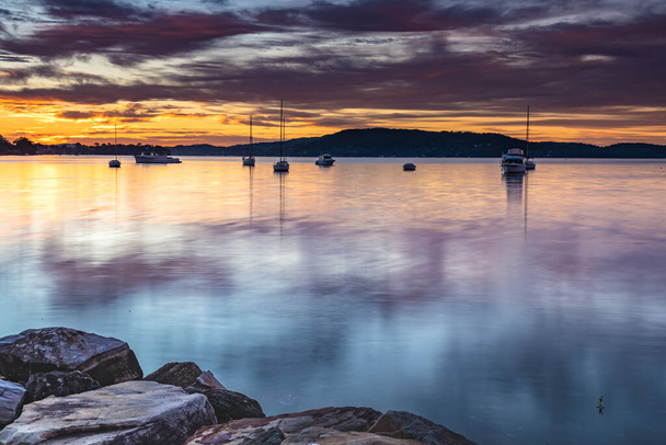 Colourful Clouds and Sunrise from Koolewong Waterfront on the Central Coast, NSW, Australia. - 写真・画像