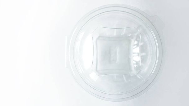 Empty Transparent plastic Container on White - Foto, afbeelding