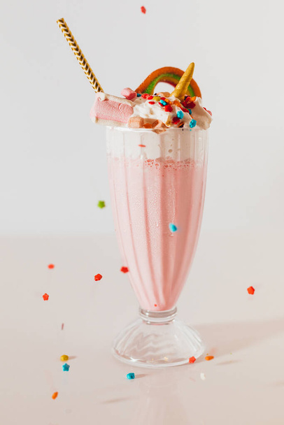 glass of strawberry milkshake isolated on white - Fotó, kép