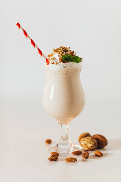 glass of milkshake and whipped cream decoration - Photo, Image