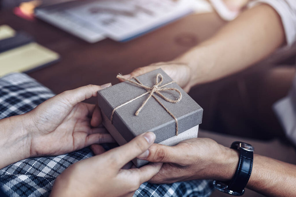 christmas, valentine, holidays gift box concept. Couple surprise gift box together. - Fotó, kép