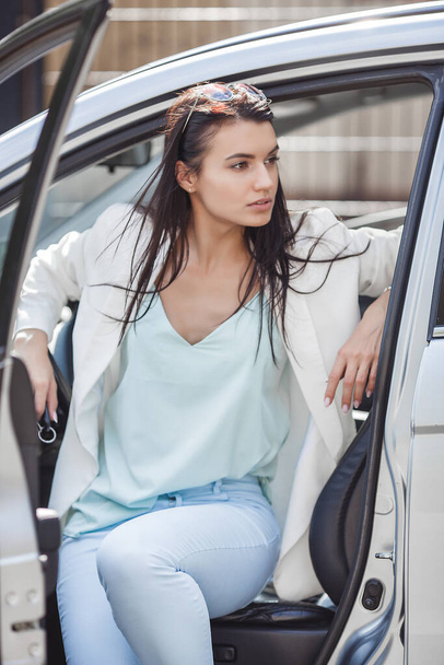 Gorgeous lady in fansy car - Photo, image