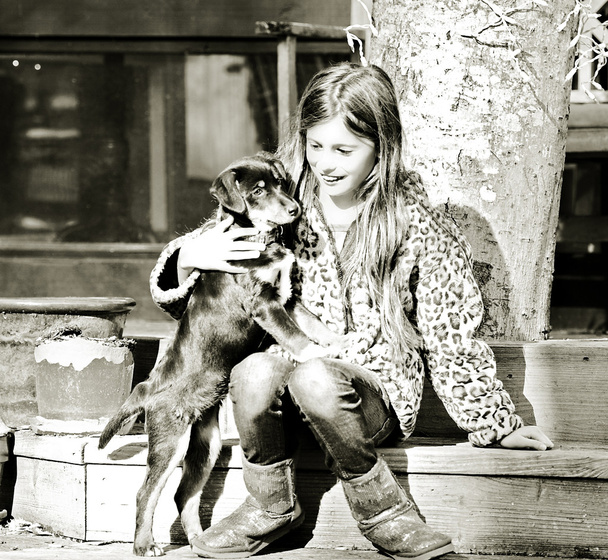Jovem com cão
 - Foto, Imagem
