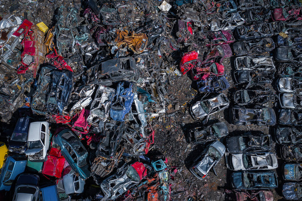 Scrapyard Aerial View. Old rusty corroded cars in car junkyard. Car recycling industry from above.  - Photo, Image