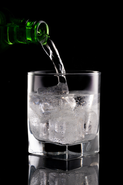 Glass of mineral water on black background - Photo, Image