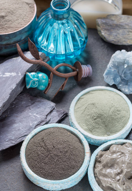 Ancient nature minerals, different types of clay used for skincare, spa treatments, face masks, gray, black, green and blue mud - Foto, Imagen