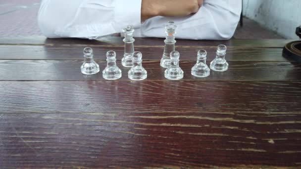 Businessman hand moving chess piece, challenges planning business strategy to success concept. - Footage, Video
