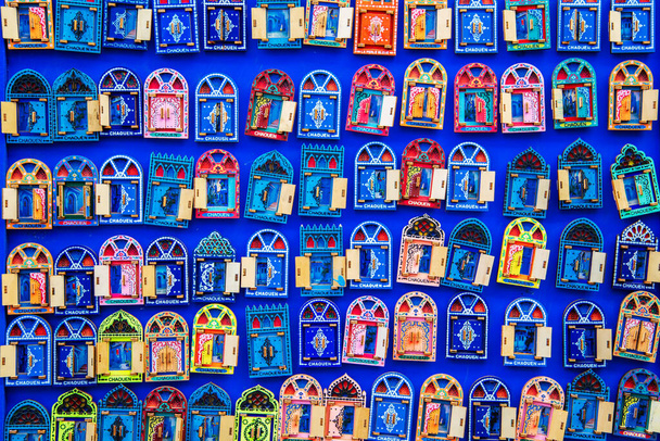 Bright magnets on the moroccan market. Chefchaouen, Morocco - September 13, 2019 - Fotoğraf, Görsel