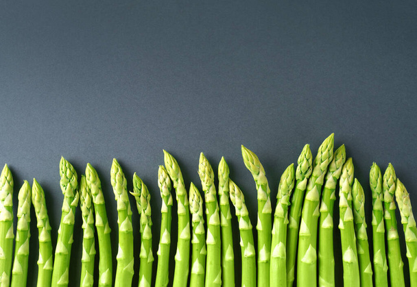 Asparagus stalks backgroound, top view - 写真・画像