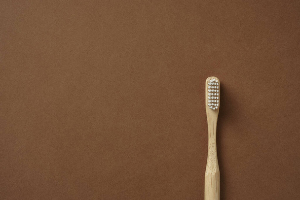 Bamboo toothbrush on carton background - Zdjęcie, obraz
