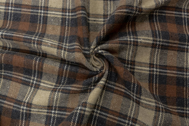 Flanellen stof textuur. Bruine fleece flanellen stof met een ruitpatroon, achtergrond, gordijn, bovenaanzicht - Foto, afbeelding