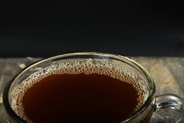 Eski usul bir arka planda bir fincan Arap kahvesi. - Fotoğraf, Görsel