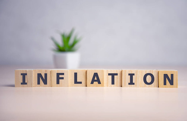 concept of the word inflation on cubes on a gray background. - Photo, Image