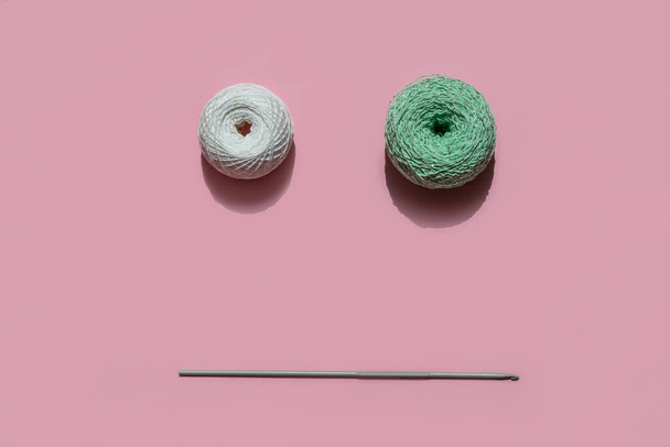 two balls of yarn and a hook - Φωτογραφία, εικόνα