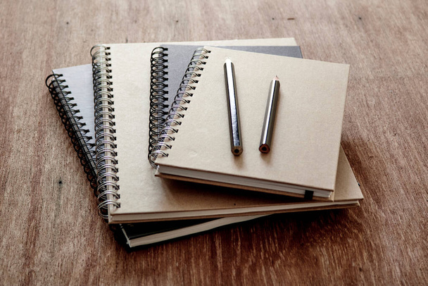 A studio photo of a note book - 写真・画像