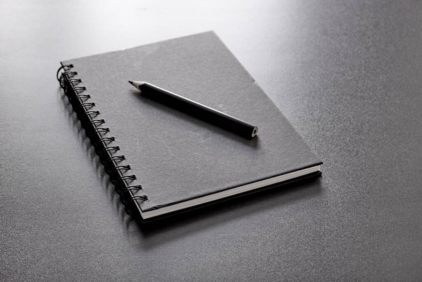 A studio photo of a blank note book - Photo, image
