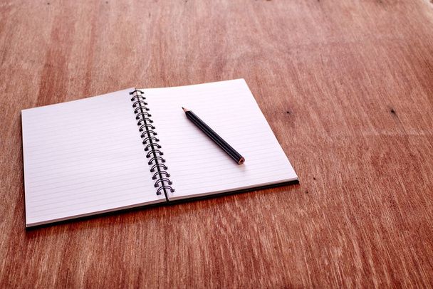 A studio photo of a blank note book - Foto, Imagen