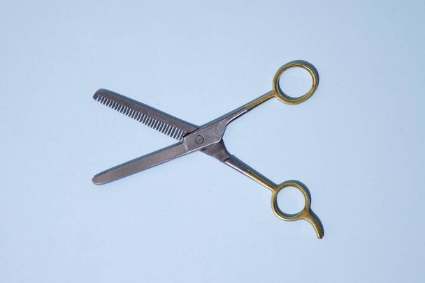 A studio photo of hairdresser scissors - Фото, изображение