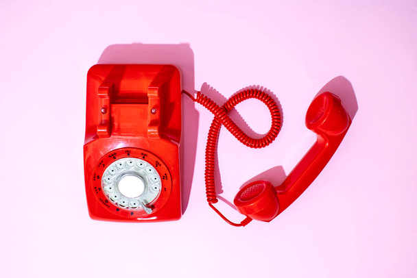 A studio photo of a vintage rotary telephone - Photo, Image