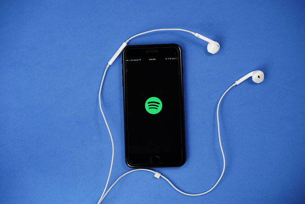 KUALA LUMPUR - AUGUST 15,2017. Spotify app on smartphone. Spotify is a popular commercial music streaming service. - 写真・画像