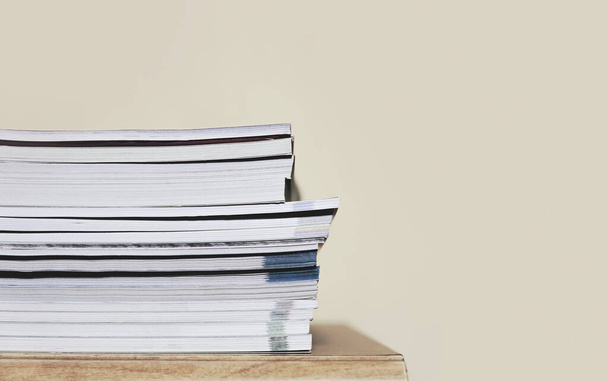 a stack of book on wooden table with copyspace background. - Foto, imagen