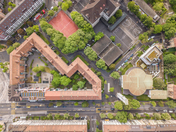 Aerial view of buildings and urban cityscape with streets in overhead view. Beautiful roof of urban housing. Zurich city in Switzerland in Europe from above. - Foto, afbeelding