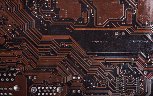 Placa de circuito marrón impreso moderno, placa de circuito electrónico, textolita. Banner de fondo. - Foto, Imagen