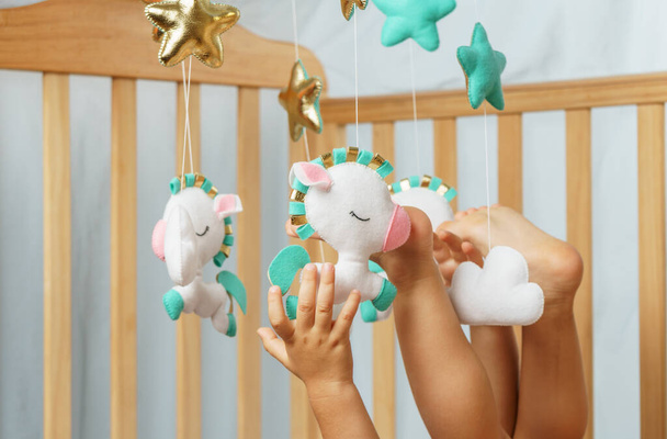 Baby crib  mobile - kids toys, on white background. - Photo, Image