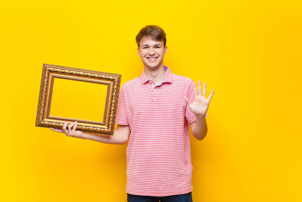 young blonde man with a baroque frame - Foto, afbeelding