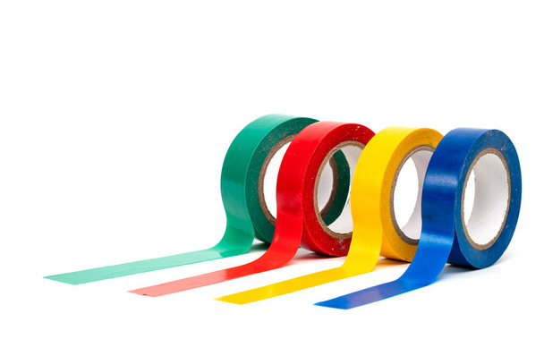Рулоны изоляционной клейкой ленты, разноцветные ленты на белом фоне
 - Фото, изображение