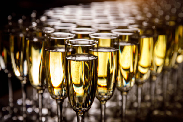 Glasses with champagne. Back light - Фото, изображение
