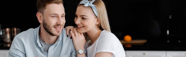 panoramic shot of cheerful girl looking at happy boyfriend   - Zdjęcie, obraz