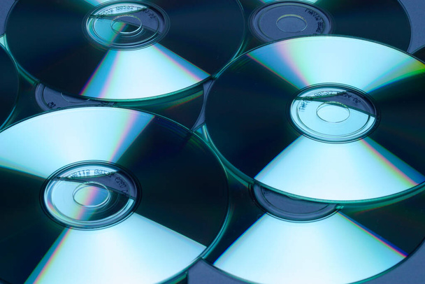 Padrões de reflexão em discos compactos
 - Foto, Imagem