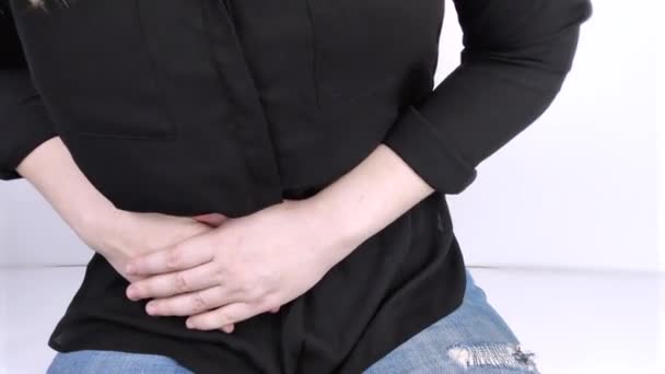 A woman suffers from pain in the appendix. Acute appendicitis, Crohn's disease, or inflammatory bowel disease. Surgeon examination and preparation for laparoscopic appendectomy - Footage, Video