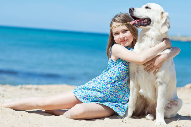 A child with a dog in nature.  - Photo, Image