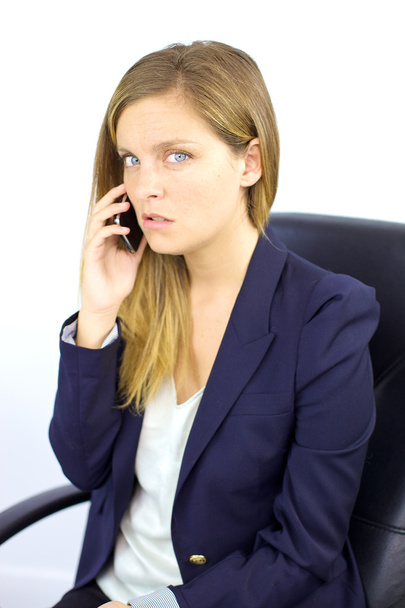 Worried woman on the phone - Φωτογραφία, εικόνα