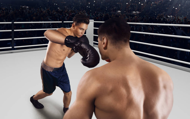 Kaksi nyrkkeilijää taistelee ammattilaisnyrkkeilykehässä.. - Valokuva, kuva