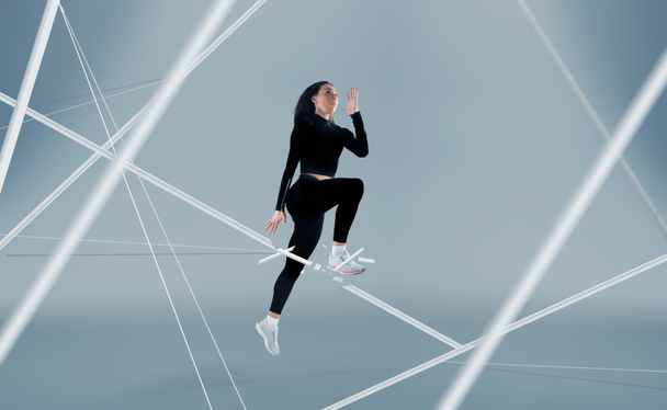 Sportovkyně běhající a skákající. Boční pohled záběr zdravé wo - Fotografie, Obrázek