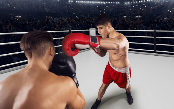 Zwei Boxer kämpfen im Profiboxring. - Foto, Bild