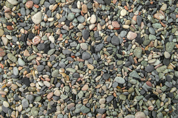 Το φόντο των μικρών πετρών φωτογραφίζεται στο φως της ημέρας. - Φωτογραφία, εικόνα