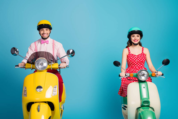 Portrait of positive wife husband bikers driver ride drive mopped chopper enjoy trip vacation journey wear red dotted dress pink isolated over blue color background - Foto, Imagen