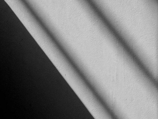 Abstract background of a white wall with shadows from the window. - Zdjęcie, obraz