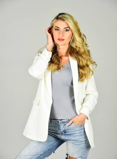 Cute and stylish. lady wear casual style. fashionable facial cosmetics for makeup. hairdresser for female. be in trend. pretty woman with blond curly hair. beauty and fashion. sexy girl in jacket - Fotografie, Obrázek