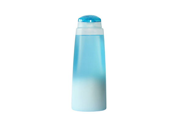 Blue cosmetic bottle on a white background. Shampoo, lotion. Shower gel - 写真・画像