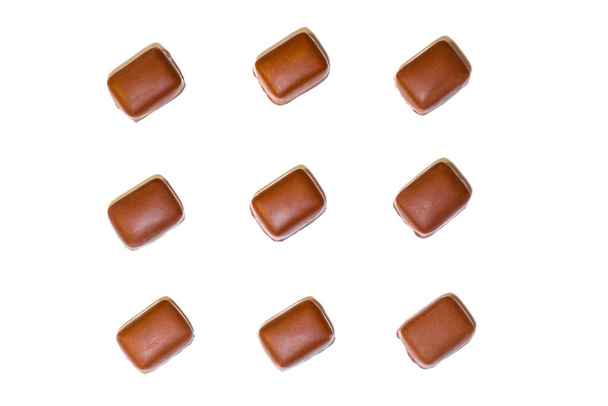 beautiful chocolates, nine chocolates without pattern isolated on white background - Foto, Imagen