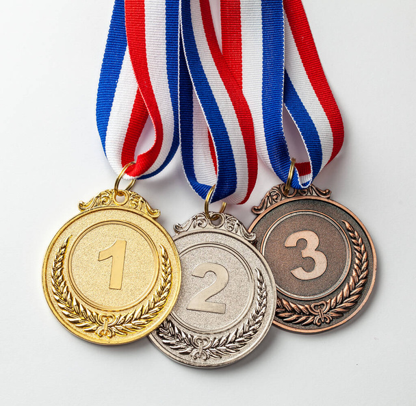 Medalha de ouro, prata e bronze. Prémio pelo primeiro, segundo e terceiro lugar
 - Foto, Imagem