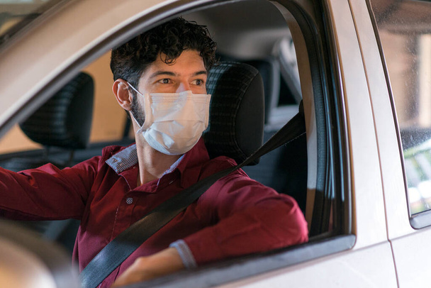 Application driver wearing medical mask. - Photo, Image